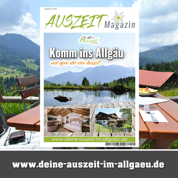 a magazine with a landscape and a lake